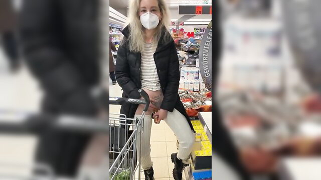 Hot blonde in mask flashes pussy pushing cart in public supermarket