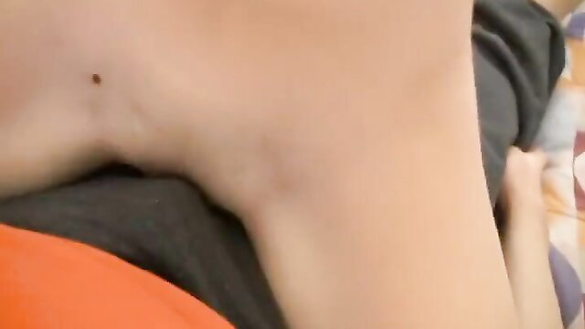 Cute Asian babe teases with legs spread, pale skin and tiny navel piercing