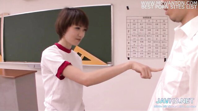 Cute Japanese schoolgirl in gym uniform points at man in JAV classroom scene