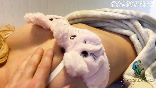 Blonde babe in bunny mask & lingerie teases tits on bed