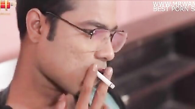 Indian man in glasses smoking cigarette closeup, hot desi porn thumbnail