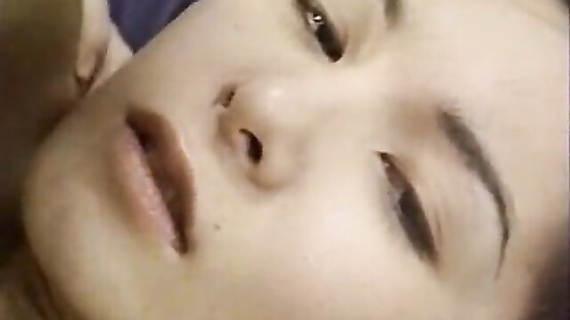 Closeup of aroused Japanese woman's face in JAV uncensored sex scene