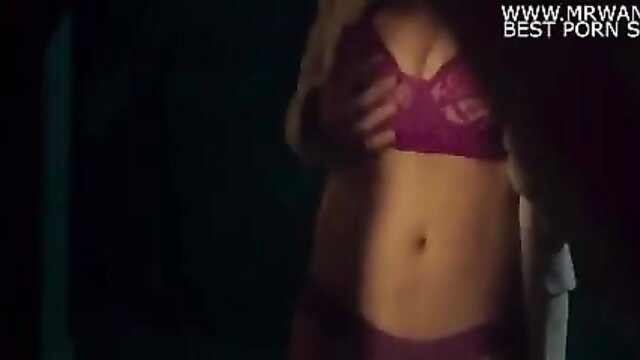 Busty Asian babe in sheer purple lace bra, teasing abs closeup