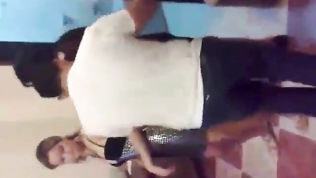 Arab guy gropes woman's big tits from behind in tight sparkly dress