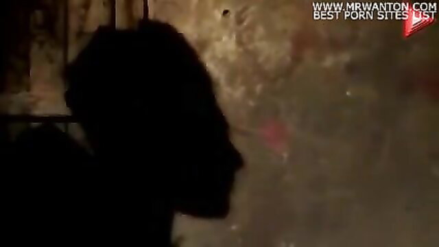 Shadowy Arab silhouette Farrah in dim erotic scene