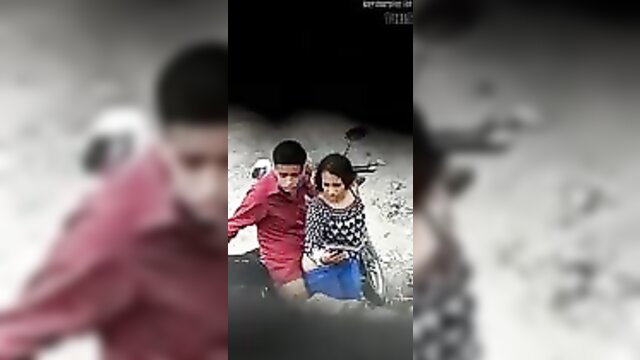Blurry Indian couple in Bangalore-style outdoor sex embrace