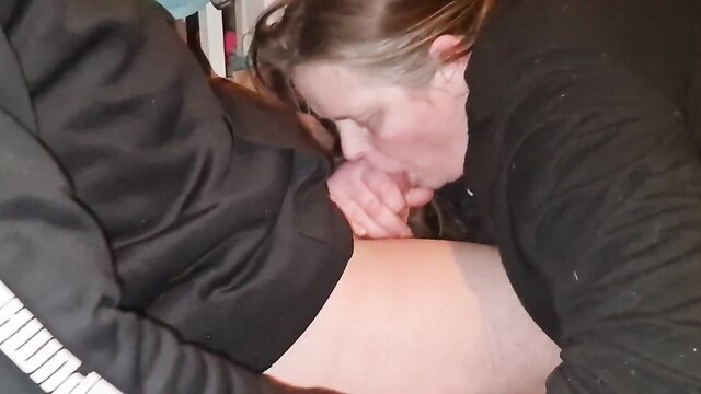 Two women in lesbian oral sex, one sucking pussy in closeup