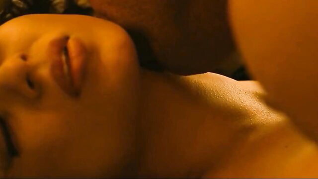 Sunny Leone closeup neck kiss in steamy sex scene