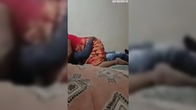 Indian aunty in red saree masti with man on bed