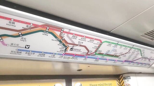 Hong Kong MTR subway map overhead sign in red light district