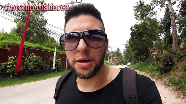 Antonio Mallorca in sunglasses on Thailand street, amateur Thai teen hookup vibe