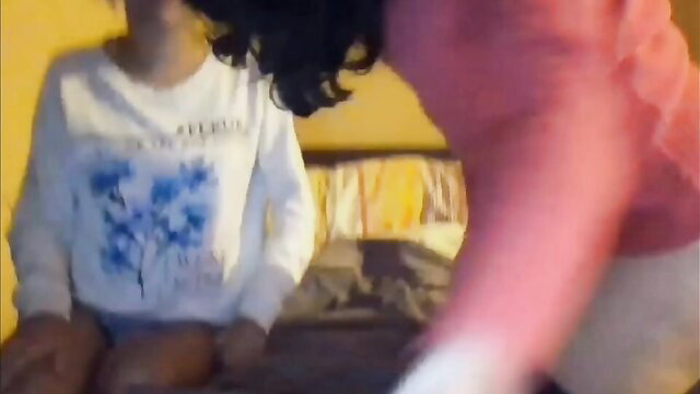 Two hot amateur girls in tight tops playing on bed