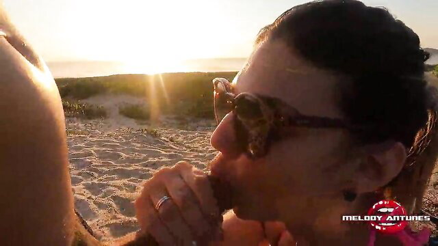 Melody Antunes sucking cock at sunrise beach blowjob