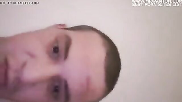 Close-up POV of shaved head white man's intense face in amateur BG porn