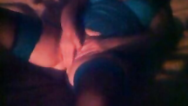 Hot wife masturbates with fingers on bed in amateur video