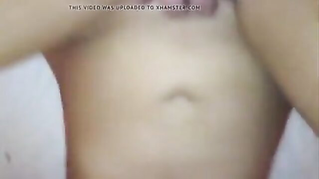 Closeup of woman's pale smooth belly and hips in amateur threesome