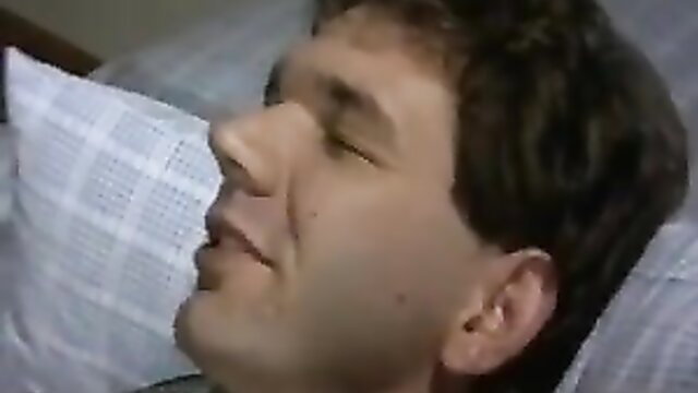 German mature man sleeping close-up face on pillow in bed