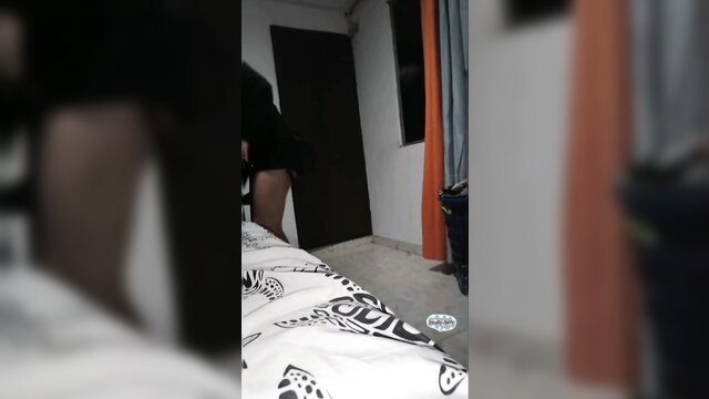 Amateur Asian woman bending over bed in short dress flashing ass