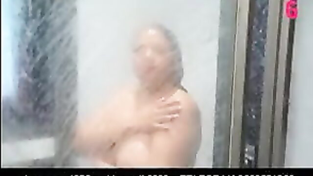 Savita Bhabhi nude in steamy shower, wet Indian bhabhi tits visible