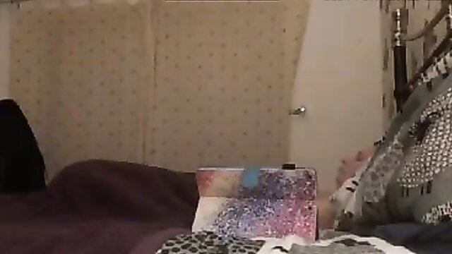 Amateur solo girl quiet orgasms on bed, stifling moans