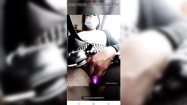 Asian amateur babe in fishnets fingers pussy POV in car, masked