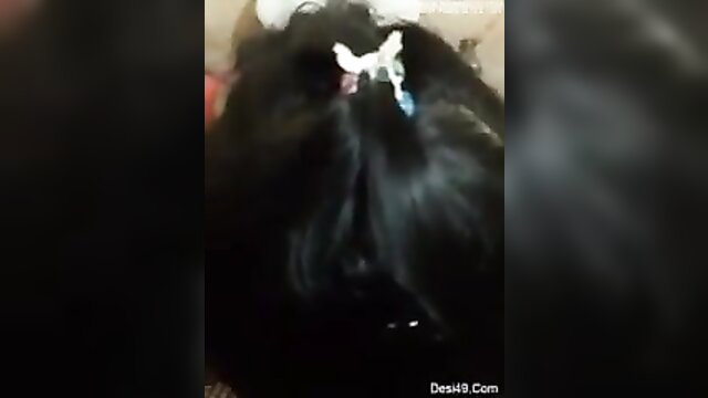 Beautiful Indian Desi Girl with black hair and butterfly hair clips closeup
