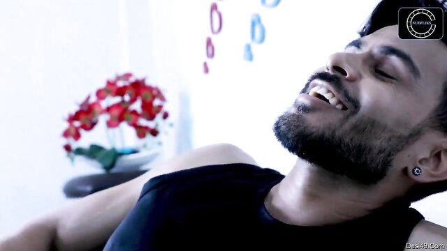 Handsome Indian bearded man smiling seductively in tank top, PYAAS 2021