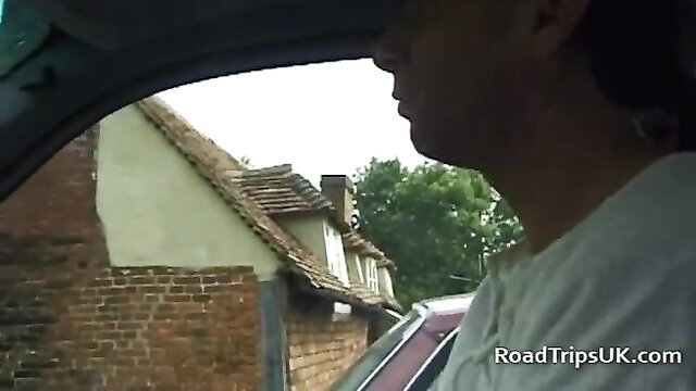 Rebekah Jordan in car on English road trip, sexy blonde tease