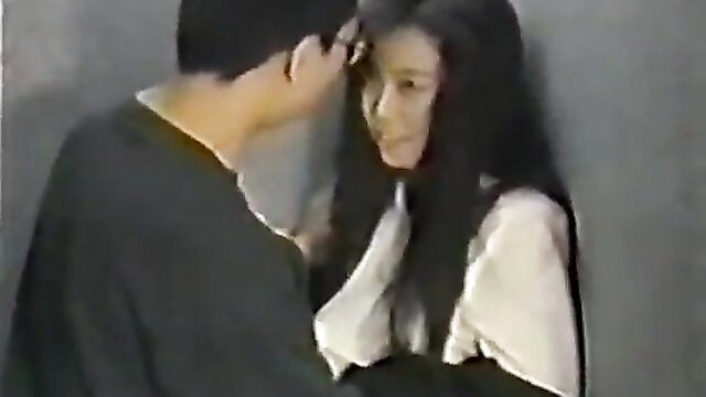 Asian beauty pinned against wall giving teasing blowjob in elevator