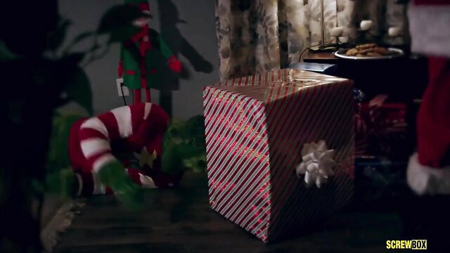 Grinch XXX parody thumbnail with festive elf, candy cane, gift box