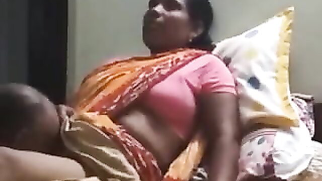 Desi maid in orange saree gets pussy licked by owner on bed