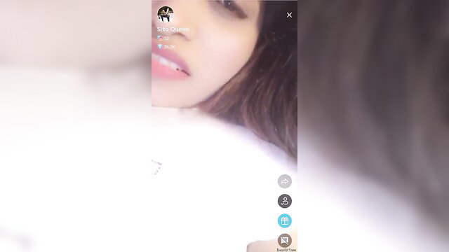 Closeup of super sexy desi woman's glossy lips and sultry eyes in homemade video