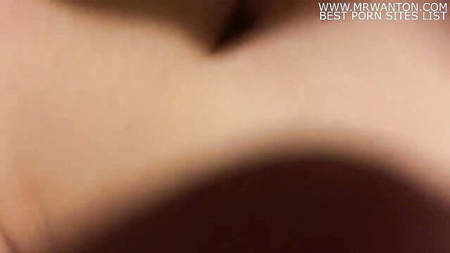 Shy Korean girl's cleavage tease, softcore closeup