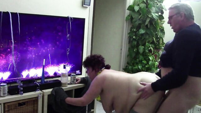 Curvy brunette bent over TV fucked doggystyle New Year's amateur