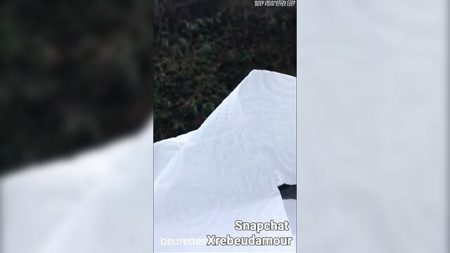 Beurette in djellaba bent over white sheet outdoors, anal tease