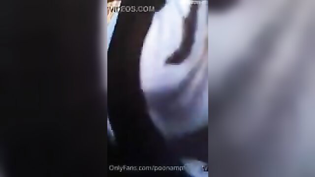 Poonam Pandey white dress cleavage tease closeup