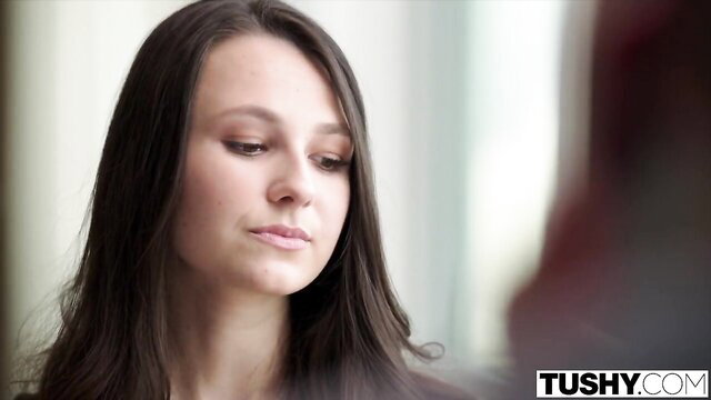 Brunette college girl with intense gaze seduces professor in TUSHY scene