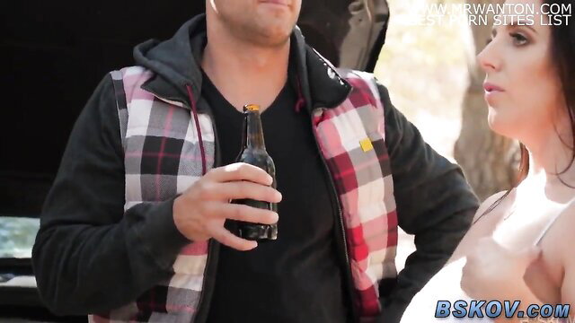 Busty brunette bombshell titfucks cock outdoors by car