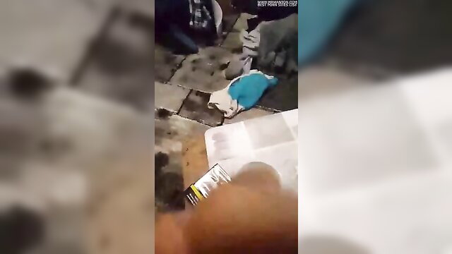 Blurry amateur POV of pale woman lying on floor in white skirt, blue panties exposed