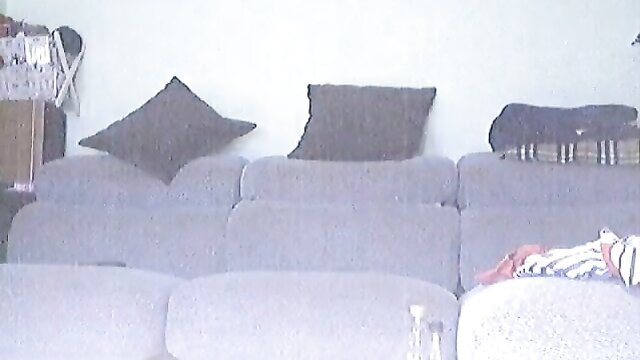 Spanish mom upskirt on gray couch, hidden cam low quality