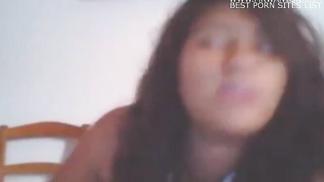 Blurry closeup of cute Asian amateur teen girl with long dark hair