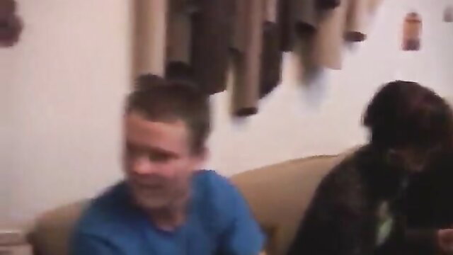 Amateur group sex thumbnail with two men on couch