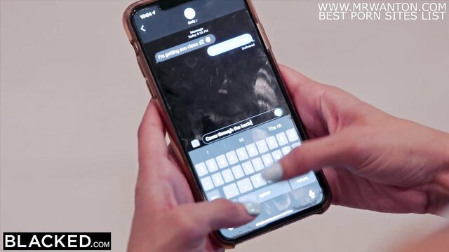 Hot girl texts on phone in Blacked video with Emily & Eliza