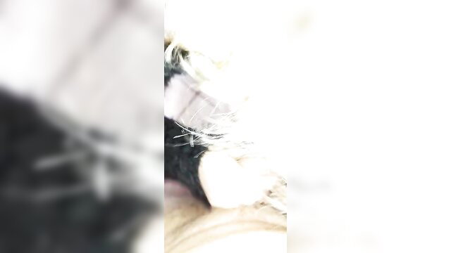 Blonde woman eagerly sucking massive hard cock closeup