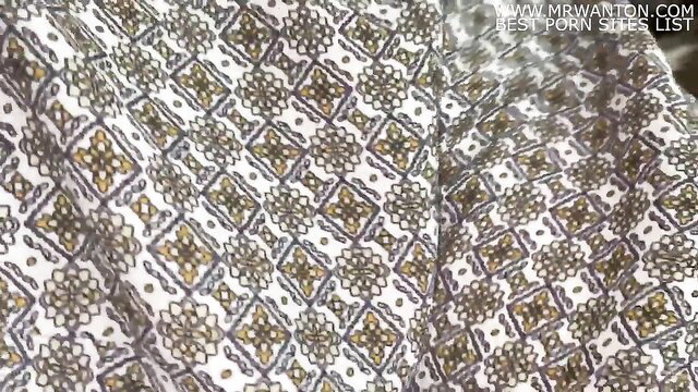 Closeup of ornate gold and white fabric texture in Korean BBC cuckold video thumbnail