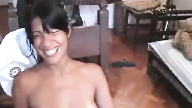 Smiling Brazilian amateur topless beauty Sheila exposing big tits