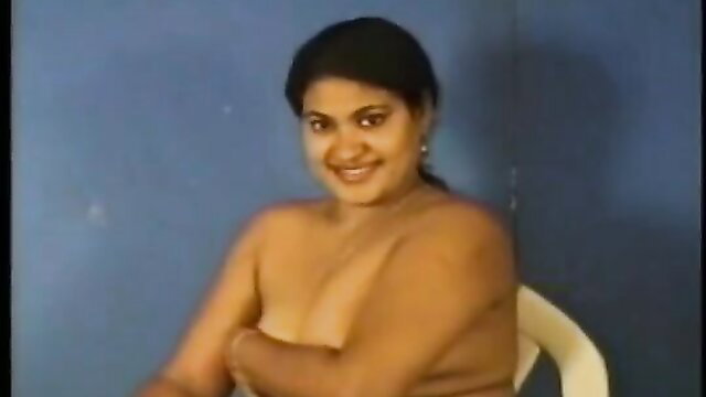 Nude Indian busty woman smiling topless at audition