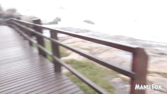 Hot amateur masturbates wildly on foggy beach boardwalk