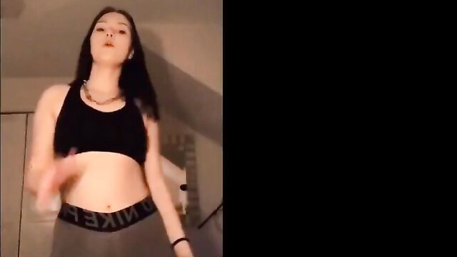 Asian TikTok girl in black Nike sports bra and leggings dances sexy