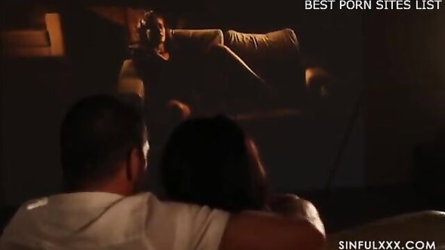 Hot couple cuddling on couch spied by maid in steamy scene